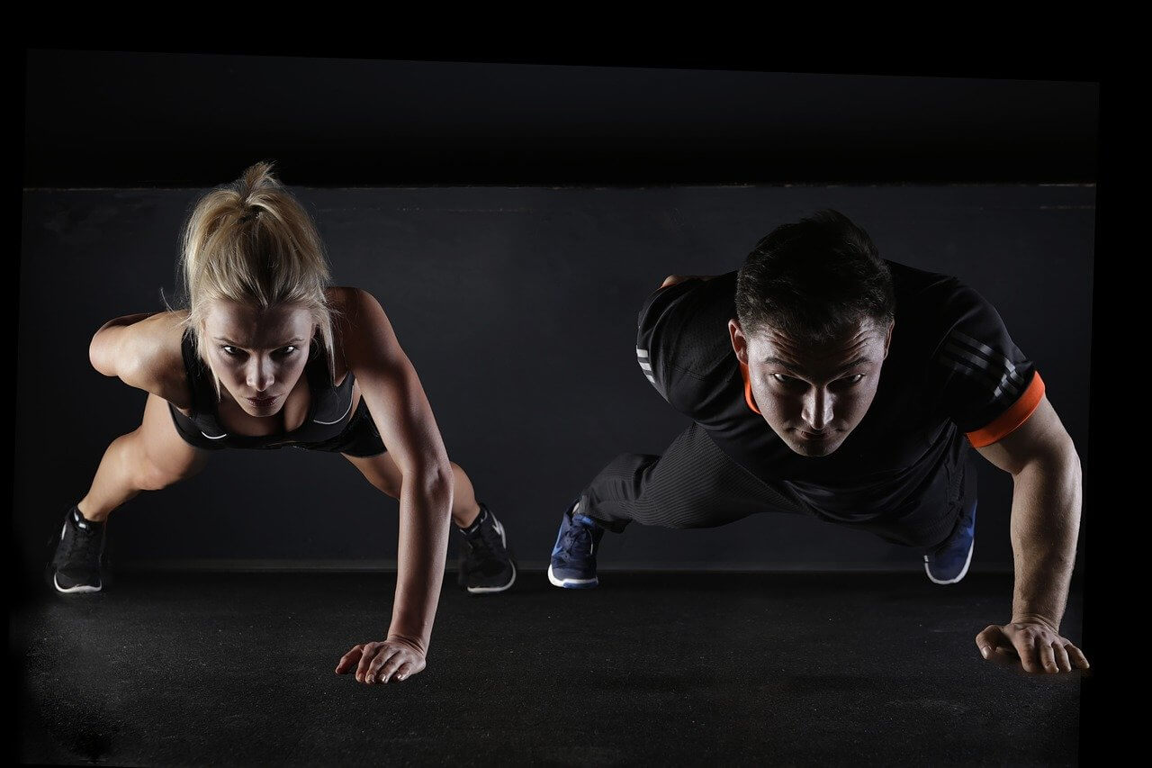 two people in the plank position